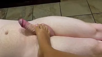 Play Using my feet to play with another cock